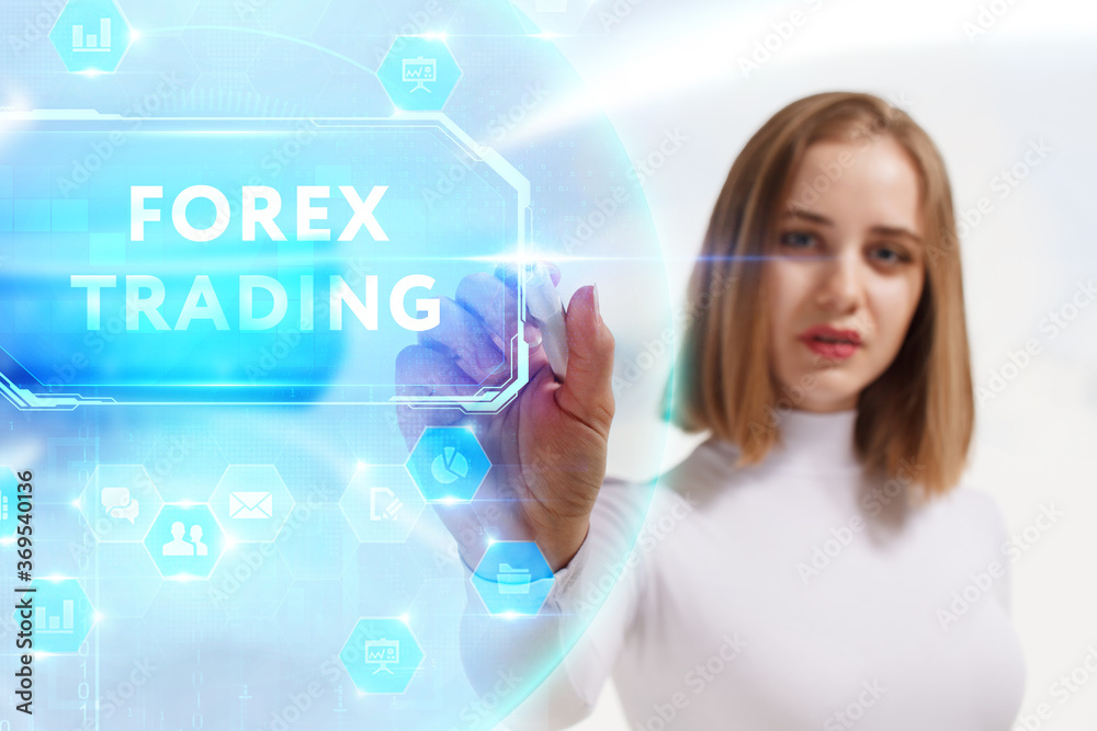 Business, Technology, Internet and network concept. Young businessman working on a virtual screen of the future and sees the inscription: Forex trading Business, Technology, Internet and network concept. Young businessman working on a virtual screen of the future and sees the inscription: Forex trading