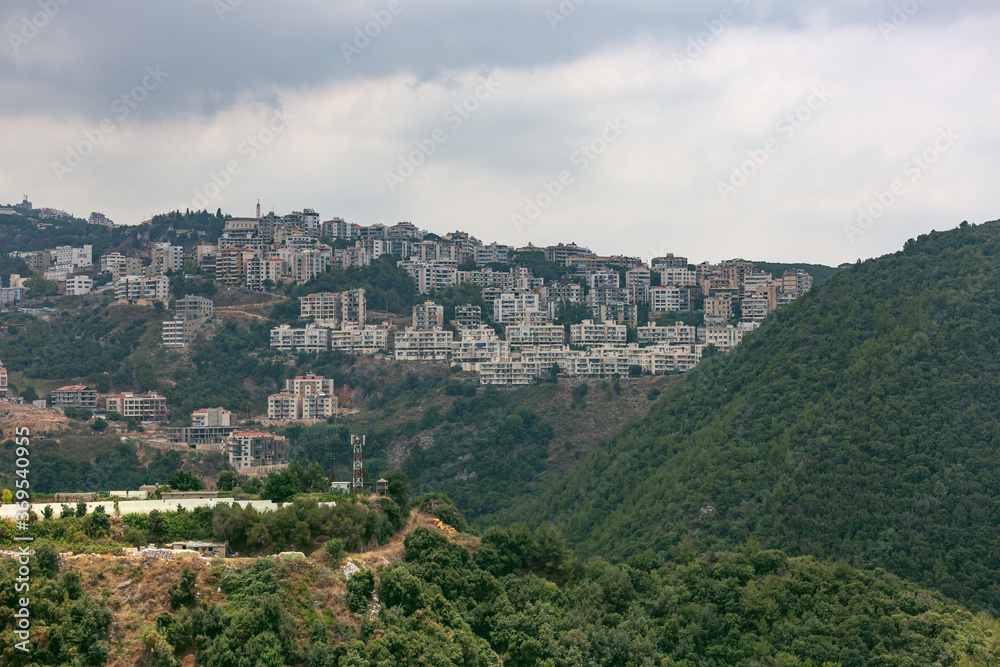 Houses in the hills, Lebanon. Dense development of the coast. Lebanese Villages near the capital