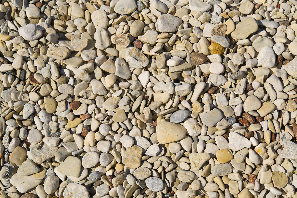 Baltick Sea beach. Natural small pebbles on the rocky seashore, can be usedas texture or backround. Baltick Sea beach. Natural small pebbles on the rocky seashore, can be usedas texture or backround.