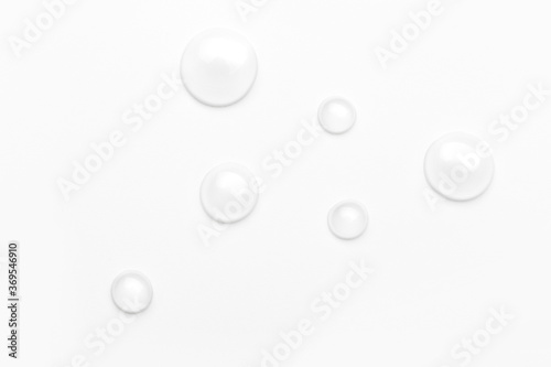 drops of water on a white background, top view © Nana_studio