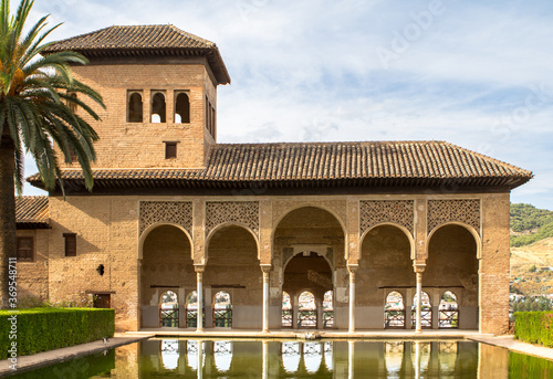Torre de las Damas in a garden of the Alhambra in Granada, Spain photo