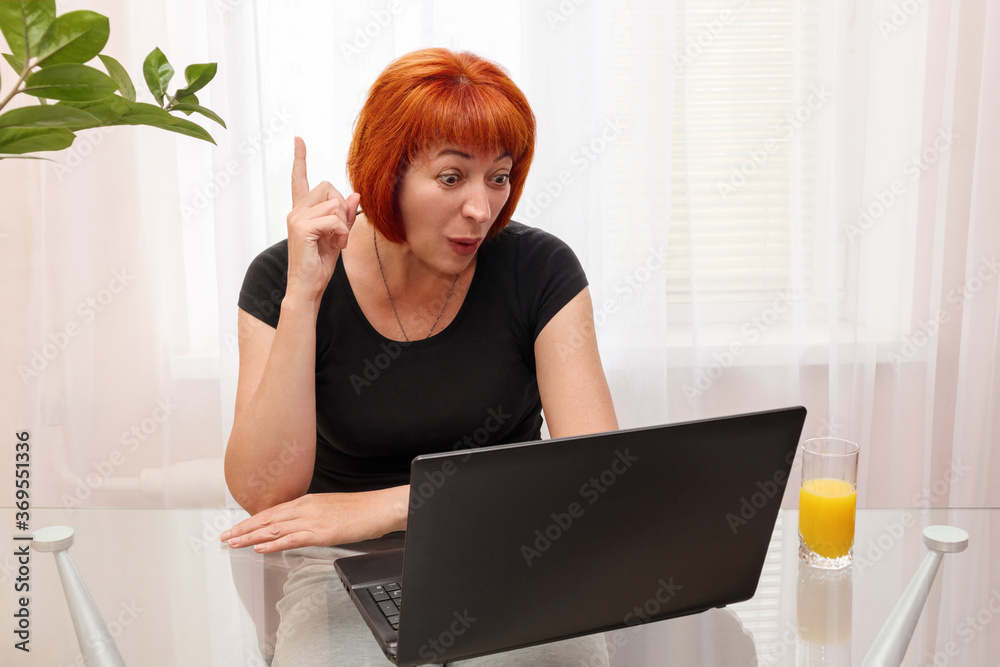 Delight, fresh idea. Women working at home using a laptop. A new normal. Delight, fresh idea. Women working at home using a laptop. A new normal.