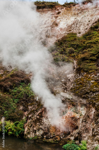 Rocky cliffs and steam in Wairakei Thermal Valley