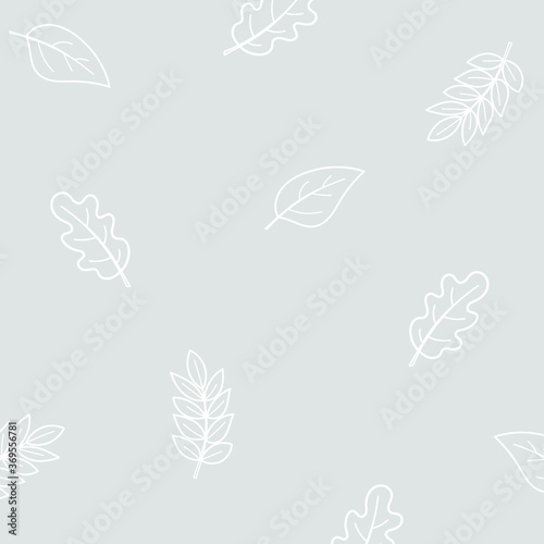 Gray background with white silhouettes of leaves