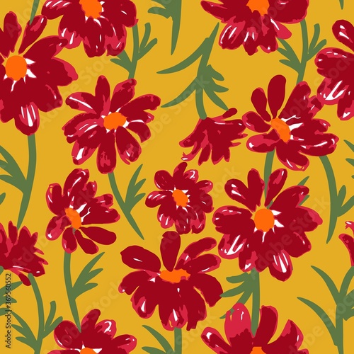 Seamless floral vector repeat pattern in an autumnal color palette with maroon red daisies on a mustard yellow background