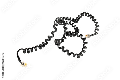 Tangled telephone wire of black color on a white background