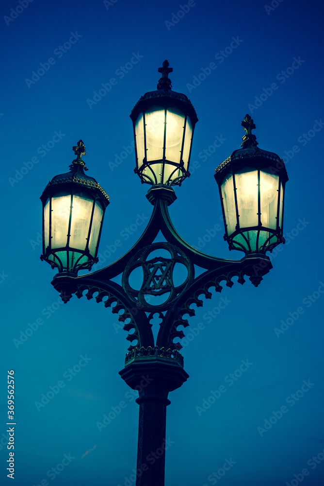 Street lamp at night, London, UK