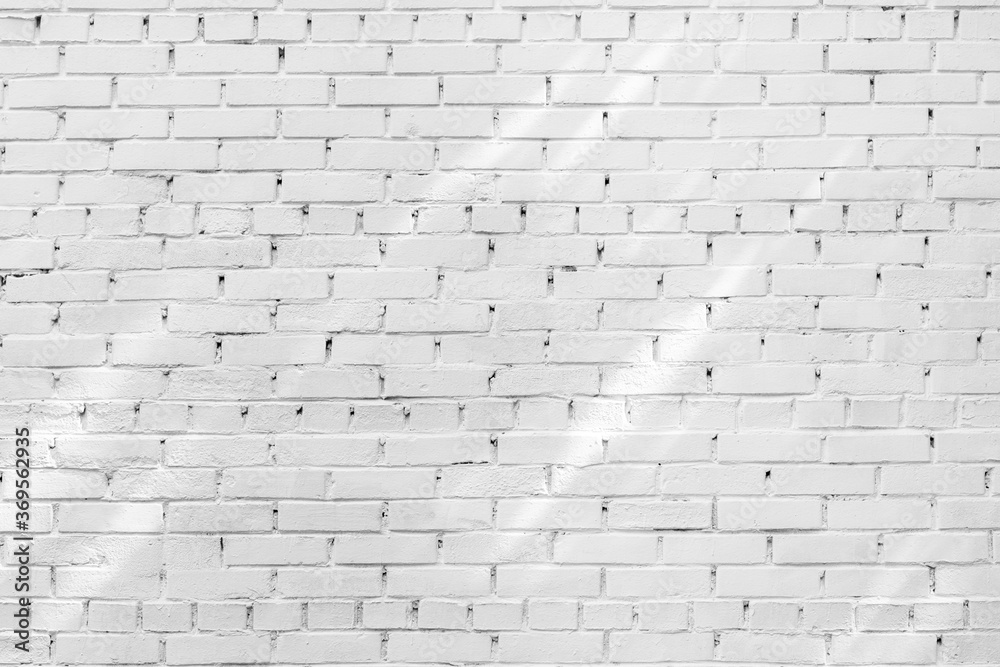 The background of the old white brick wall for design interior The background of the old white brick wall for design interior