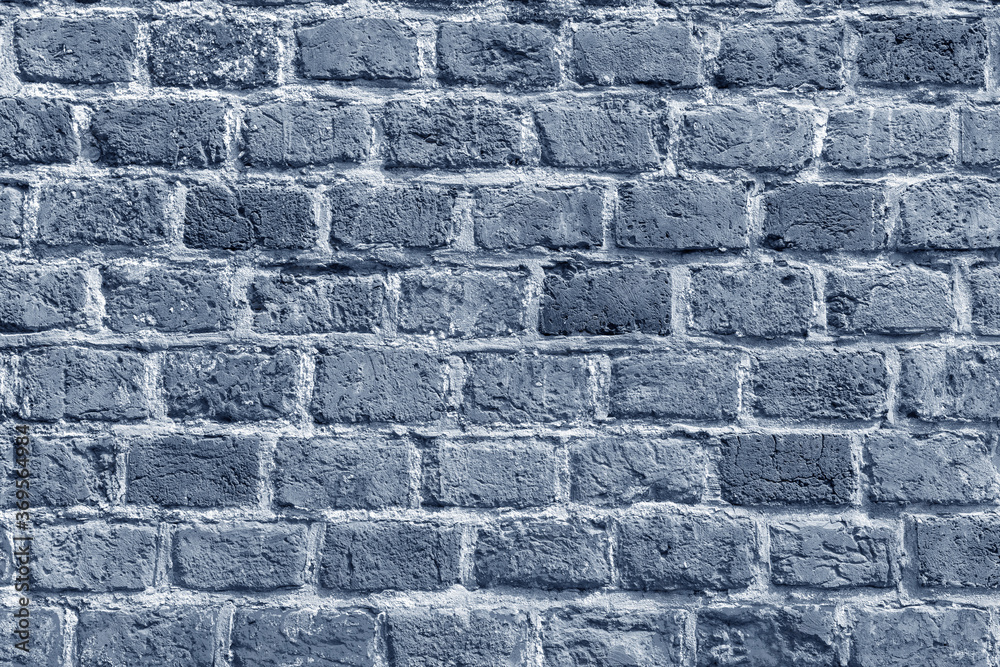 Obraz premium The background of the old gray brick wall for design interior