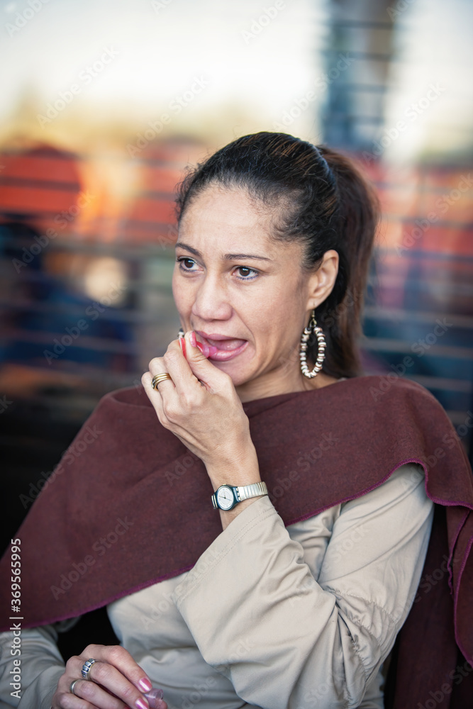 Fototapeta premium woman using lipstick