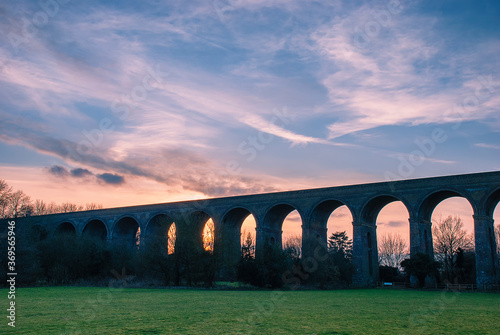 Sunset over the Chappel Viaduct in Essex, UK photo