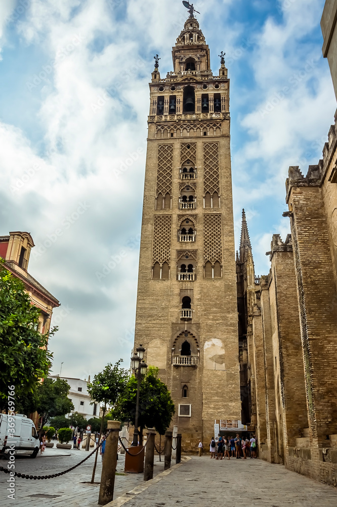 The tower of the cathedral of St Mary in Seville, Spain which was converted from a mosque minaret in the summertime