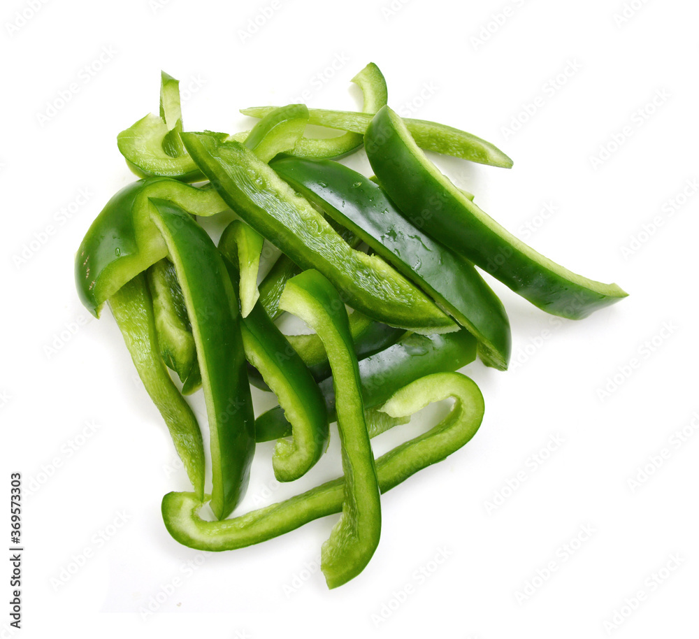 Sliced Green Peppers arranged on white background. Sliced Green Peppers arranged on white background.