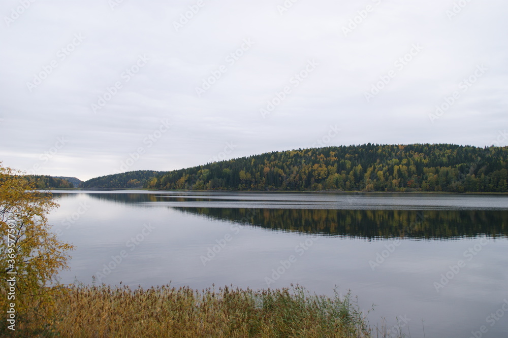 Fototapeta premium autumn landscape with lake