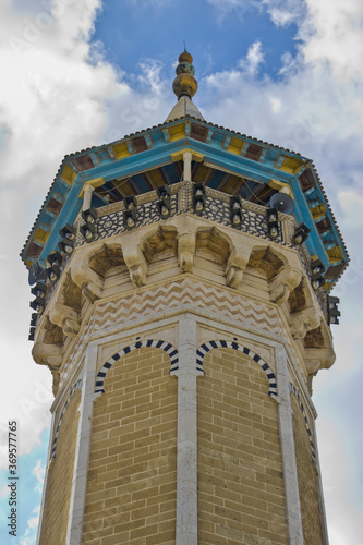 Vertical shot of the Hammouda Pacha Mosque located in Tunis, Tunisia during daylight photo