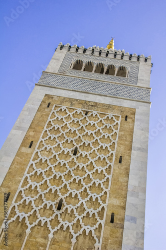 Vertical shot of the Zaytuna Mosque located in Tunis, Tunisia during daylight photo