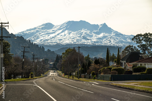 Street in Ohakune, New Zealand, with Mt Ruapehu and Turoa ski field in the background. photo