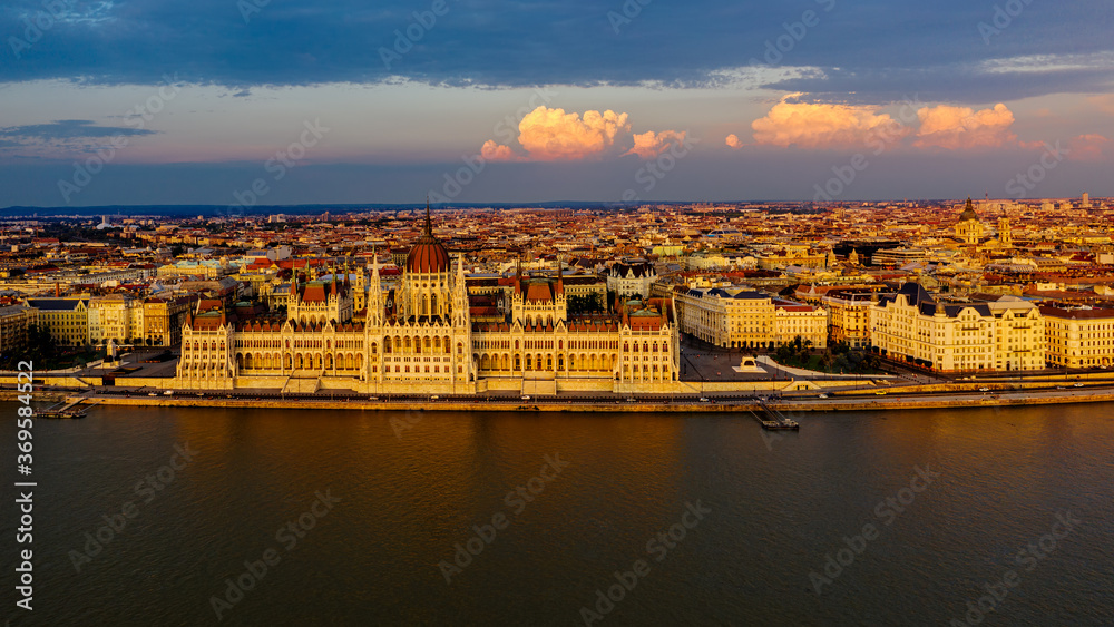 Fototapeta premium Aerial photo of the Hungarian Parliament and the city of Budapest by the Danube River