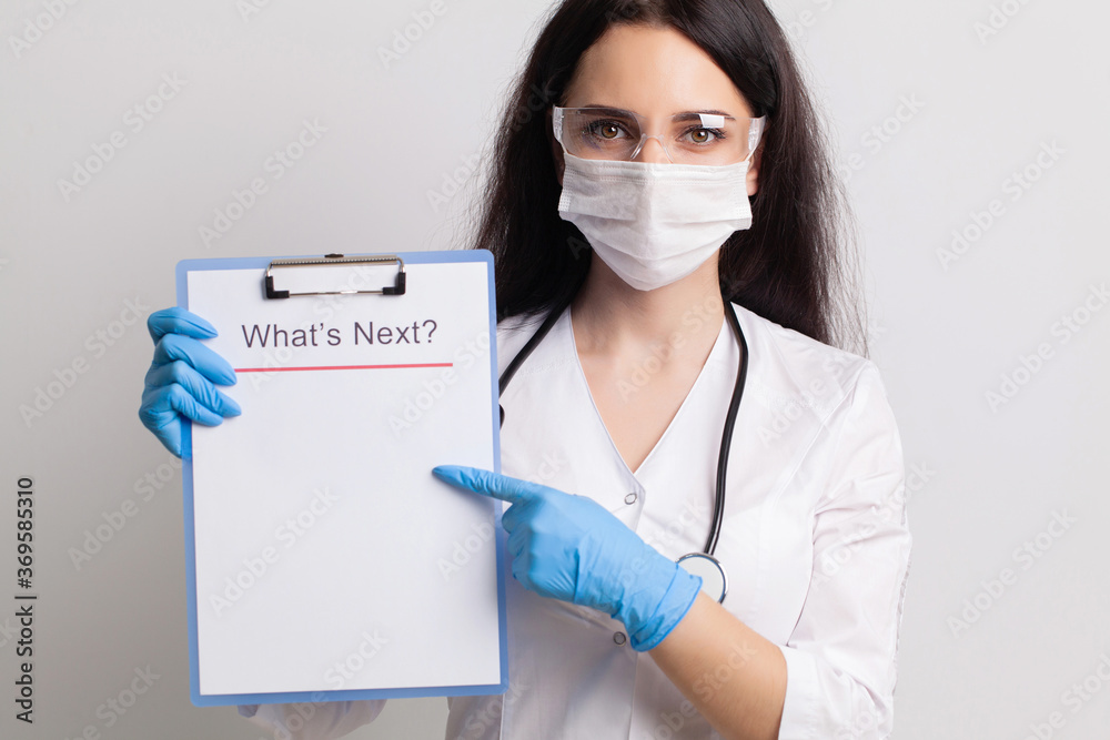 Portrait of young female doctor in medical mask Portrait of young female doctor in medical mask