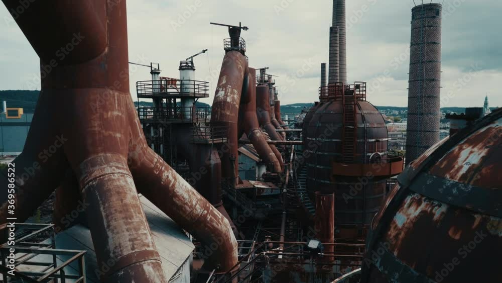 Pipes attached to factory storage tanks