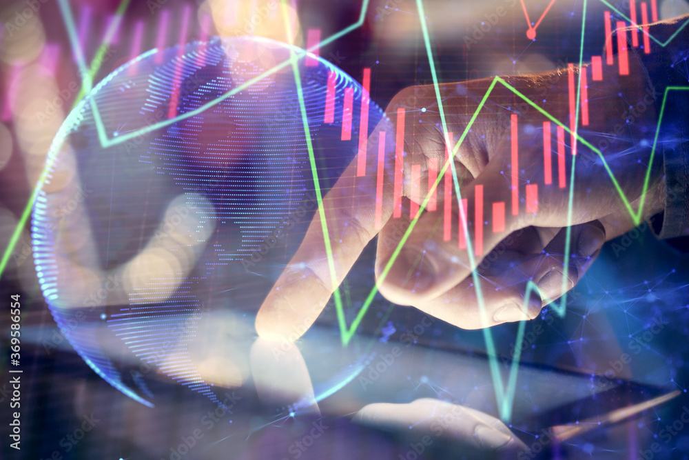 Multi exposure of man's hands holding and using a phone and financial chart drawing. Market analysis concept. Multi exposure of man's hands holding and using a phone and financial chart drawing. Market analysis concept.