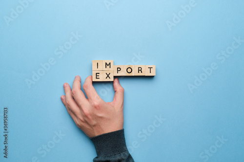 Hand points to the concept of trade relations import and export
