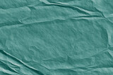Green tosca crumpled paper background.Abstract texture paper.