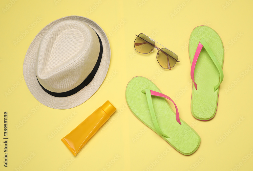 Flat lay composition with beach objects on background