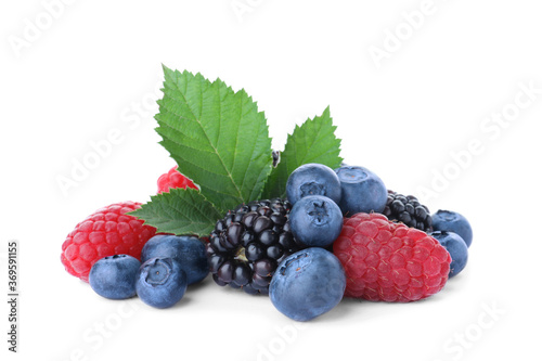 Mix of different fresh berries isolated on white