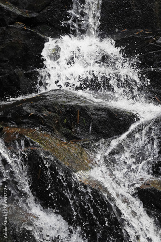 water flowing into the waterfall