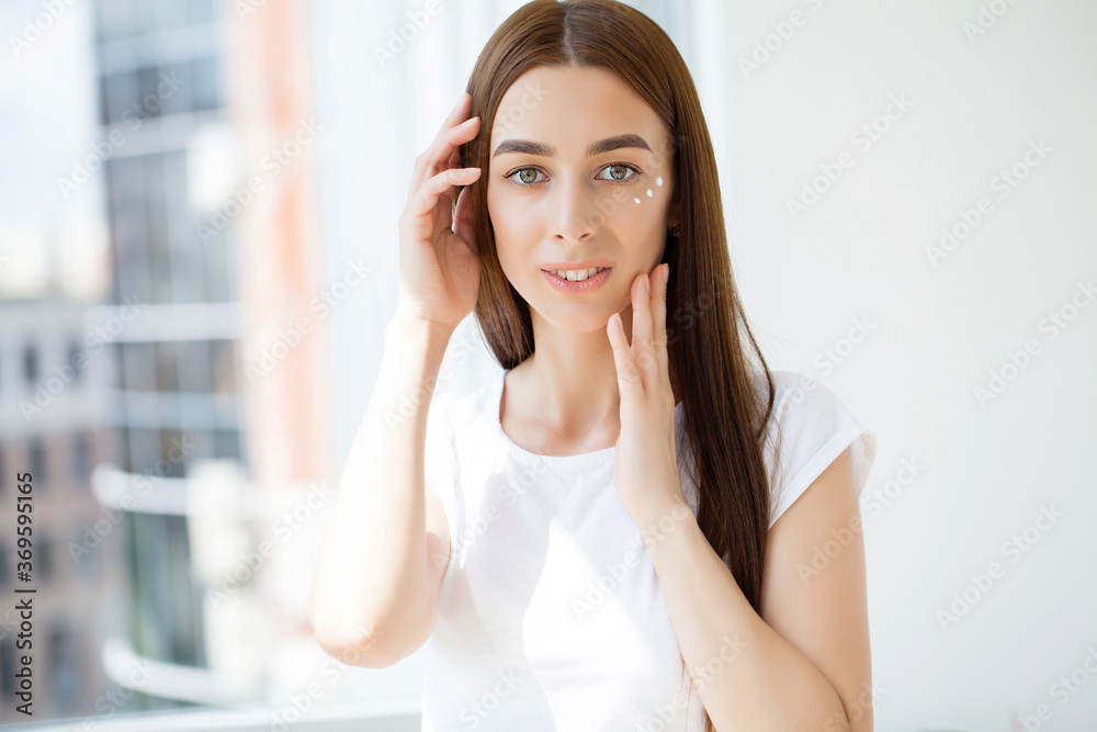Woman with beauty face touching healthy facial skin portrait. Woman with beauty face touching healthy facial skin portrait.