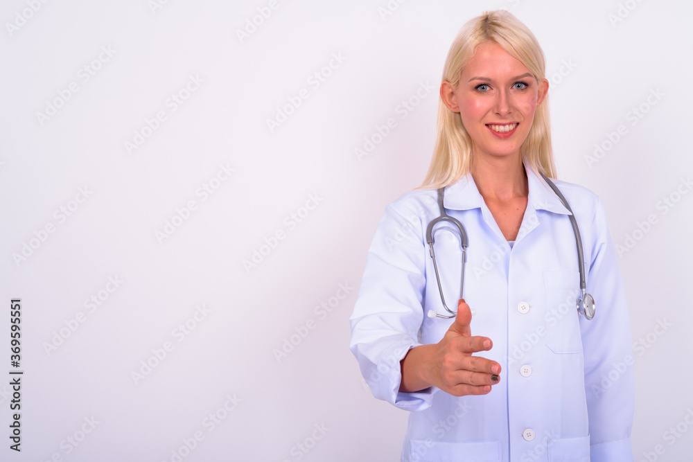 Portrait of young beautiful woman doctor with blond hair Portrait of young beautiful woman doctor with blond hair