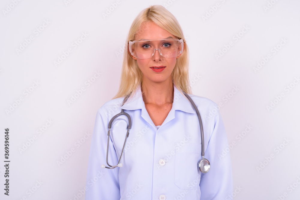 Portrait of young beautiful blonde woman doctor as scientist Portrait of young beautiful blonde woman doctor as scientist