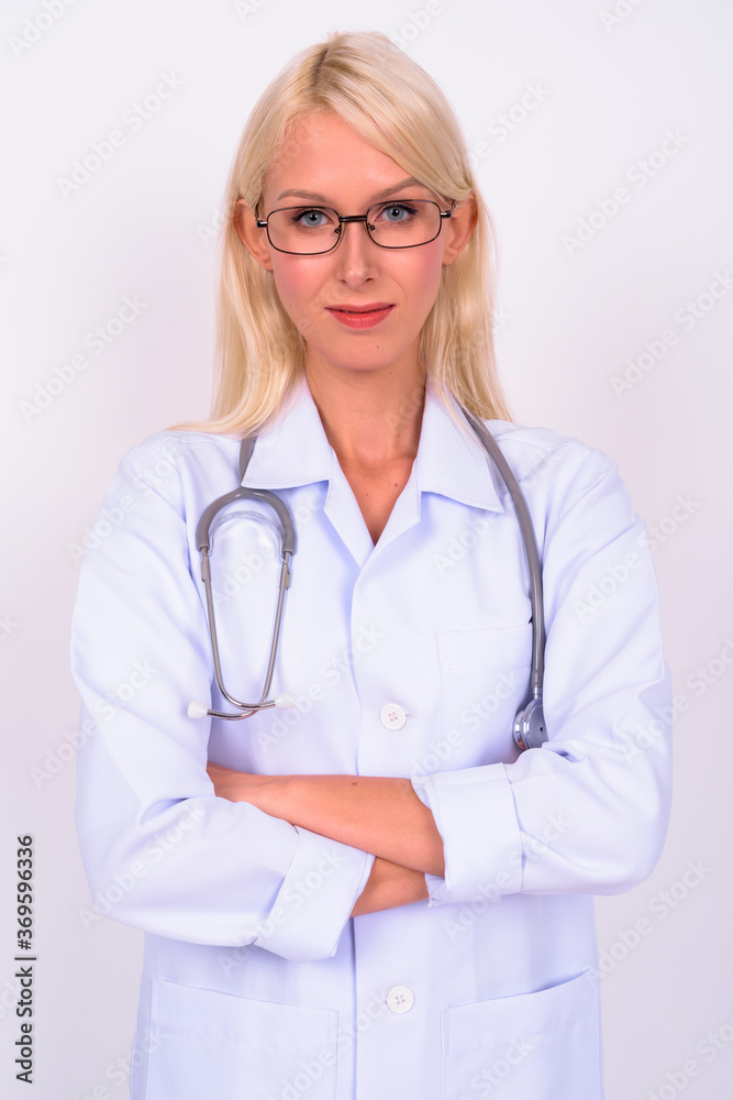 Portrait of young beautiful woman blonde doctor with eyeglasses Portrait of young beautiful woman blonde doctor with eyeglasses