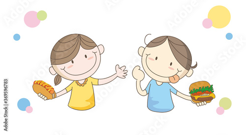 ハンバーガーを手に持つ子供たち