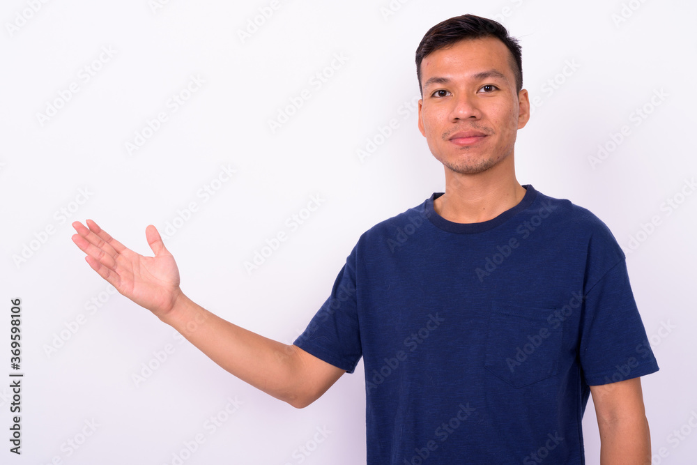 Portrait of young Asian man with beard stubble Portrait of young Asian man with beard stubble