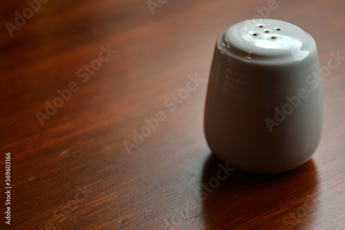 Salt and pepper shaker use to sprinkle