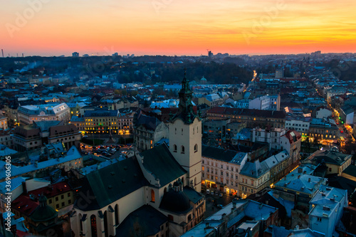 Aerial view of Latin cathedral and Rynok square in Lviv, Ukraine at sunset. View from Lviv town hall © olyasolodenko