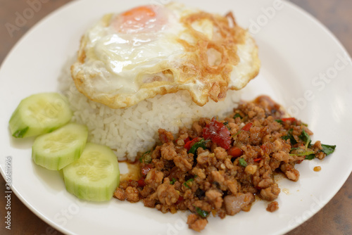 Pad Kra Pao or stir fried chicken with holy basil as traditional Thai food