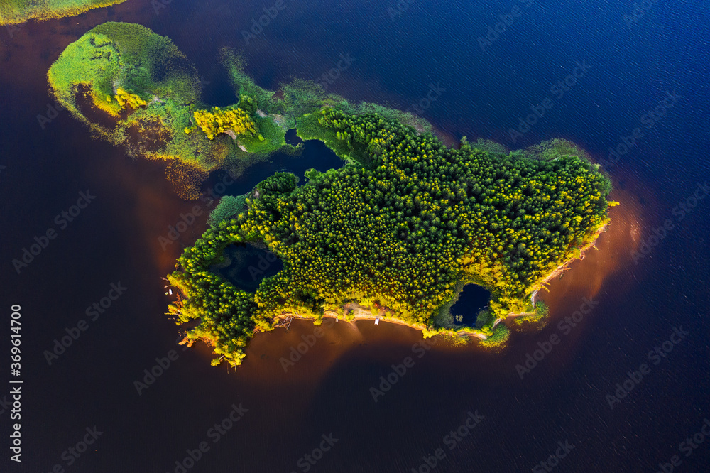 Aerial view of the green island on the river of Kama in Russia - obrazy, fototapety, plakaty 