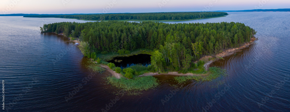 Aerial panorama of the green island on the river of Kama in Russia