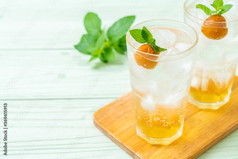 iced plum juice with soda and peppermint iced plum juice with soda and peppermint