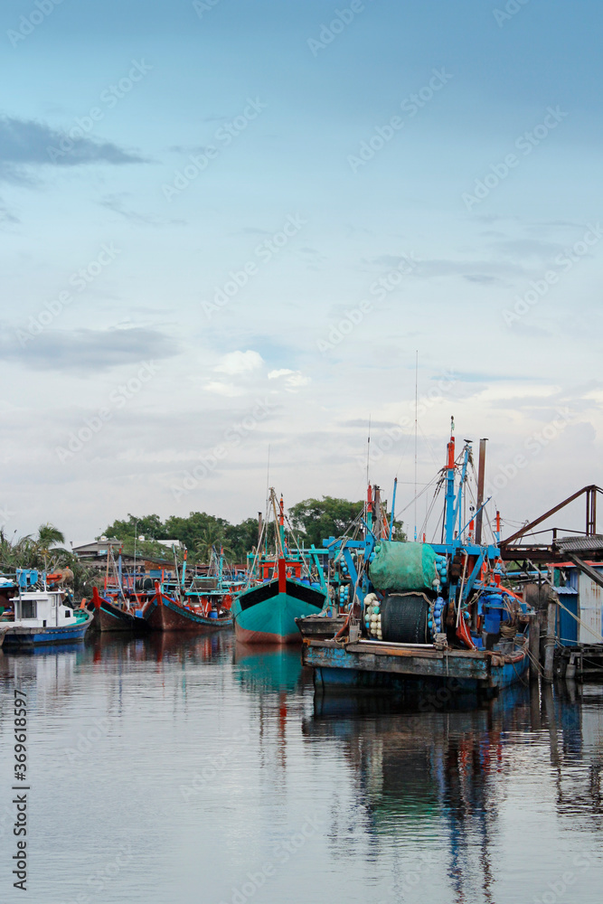 Fishing boats along the river at Bagan, Sekinchan, Kuala Selangor, Malaysia
