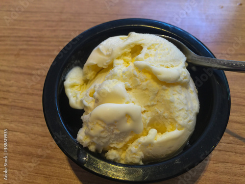 A scoop of vanilla ice cream.