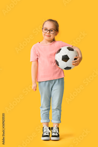 Cute little girl with socce...