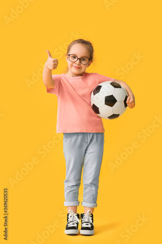 Cute little girl with socce...