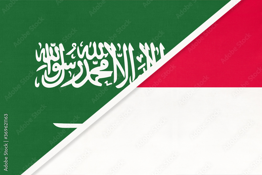 Saudi Arabia and Monaco, symbol of national flags from textile. Championship between two countries. Saudi Arabia and Monaco, symbol of national flags from textile. Championship between two countries.