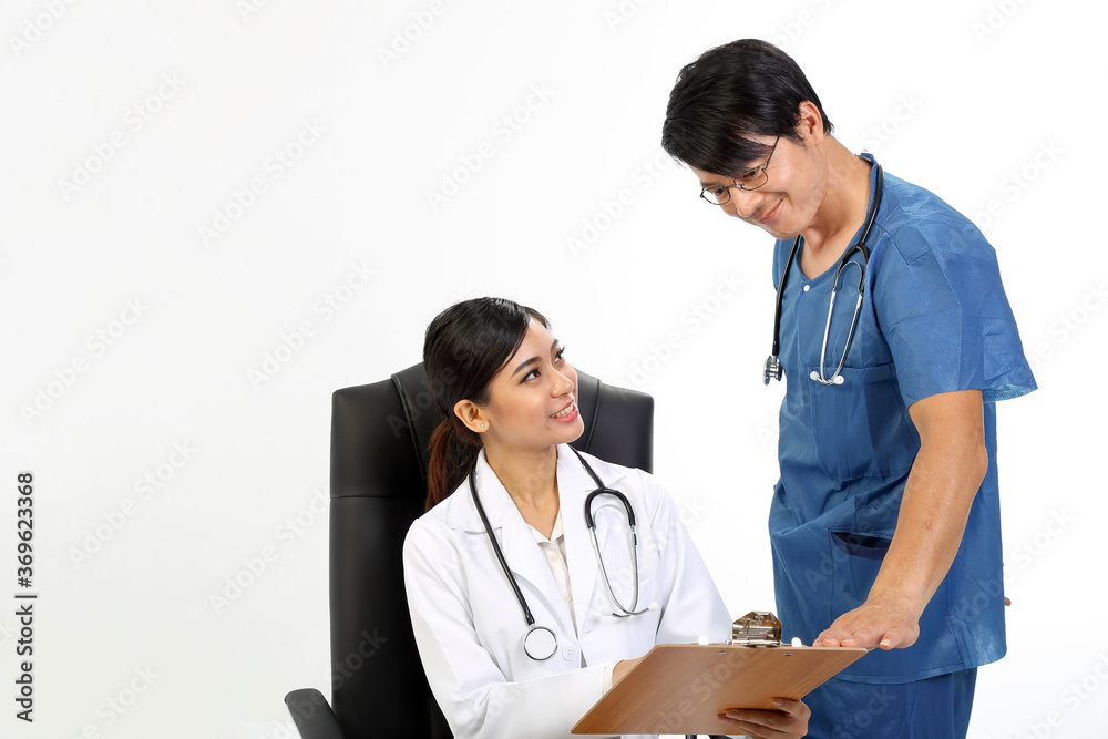 Young Asian male female doctor wearing apron uniform stethoscope sit on chair stand talk discuss Young Asian male female doctor wearing apron uniform stethoscope sit on chair stand talk discuss
