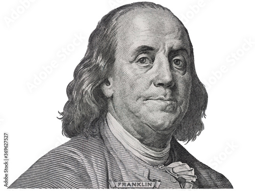 Benjamin Franklin face on us one hundred dollar bill macro isolated, united states money closeup photo