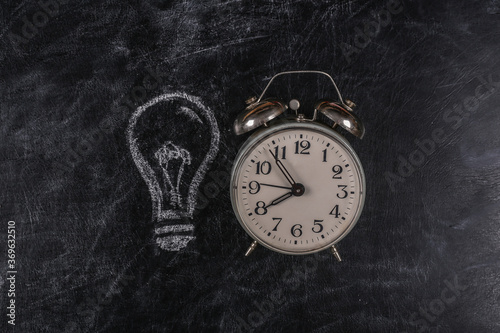 Wallpaper Mural I have an idea! Alarm Clock with a painted light bulb on a chalk board Torontodigital.ca